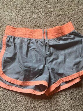 Grey and orange RBX Active athletic shorts